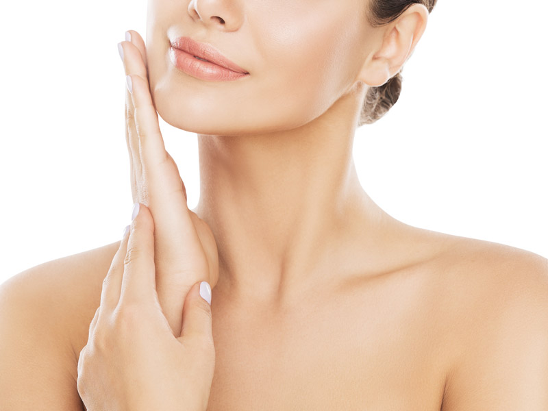 beautiful woman touching her face