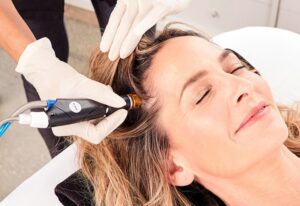 Patient getting HydraFacial Keravive Treatment in Dallas, TX Patient getting HydraFacial Keravive Treatment in Dallas, TX