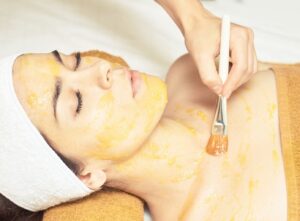 Applying body chemical peel to chest area